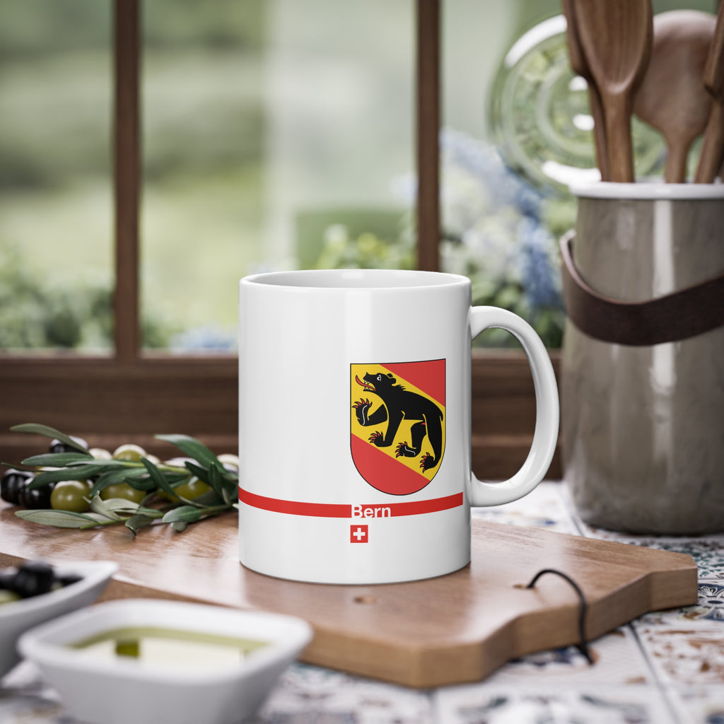 White ceramic mug featuring the Canton of Bern coat of arms with a black bear and red/yellow flag, placed on a clean background.