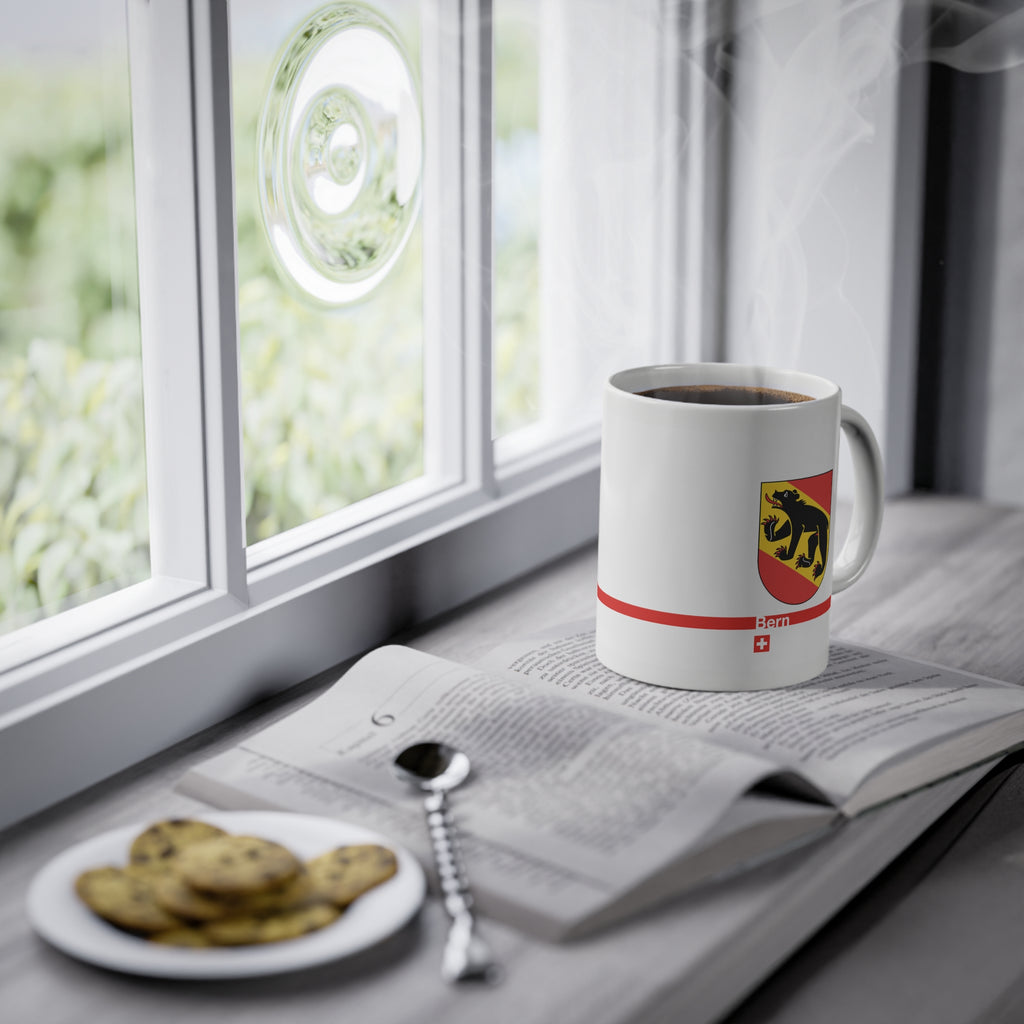White ceramic mug featuring the Canton of Bern coat of arms with a black bear and red/yellow flag, placed on a clean background.