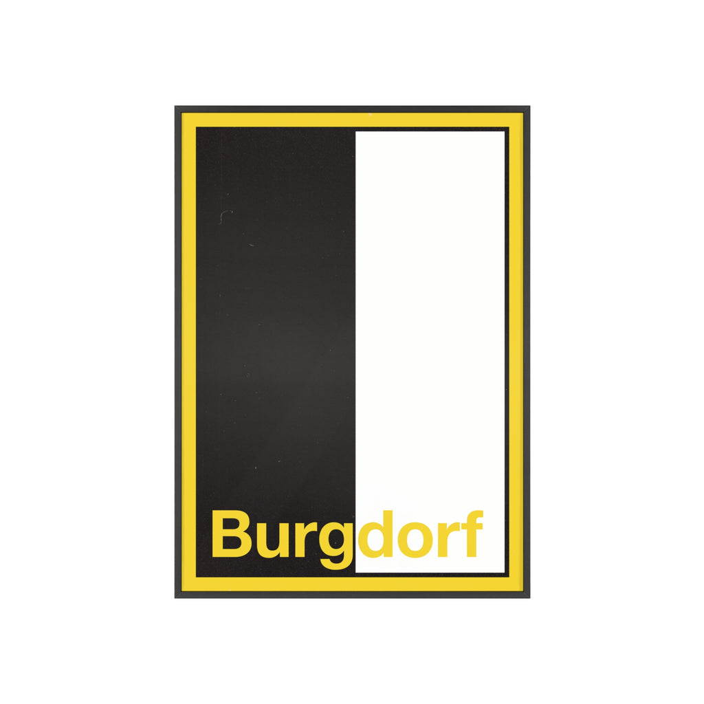 Minimalist framed wall poster of the Burgdorf coat of arms featuring vertical black and white panels with a yellow border, displayed in a natural pinewood frame.