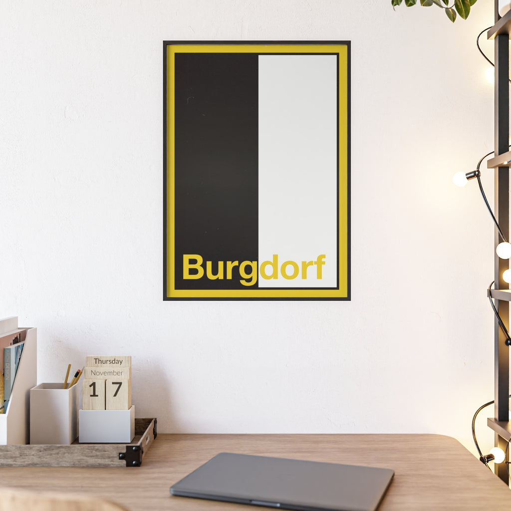 Minimalist framed wall poster of the Burgdorf coat of arms featuring vertical black and white panels with a yellow border, displayed in a natural pinewood frame.