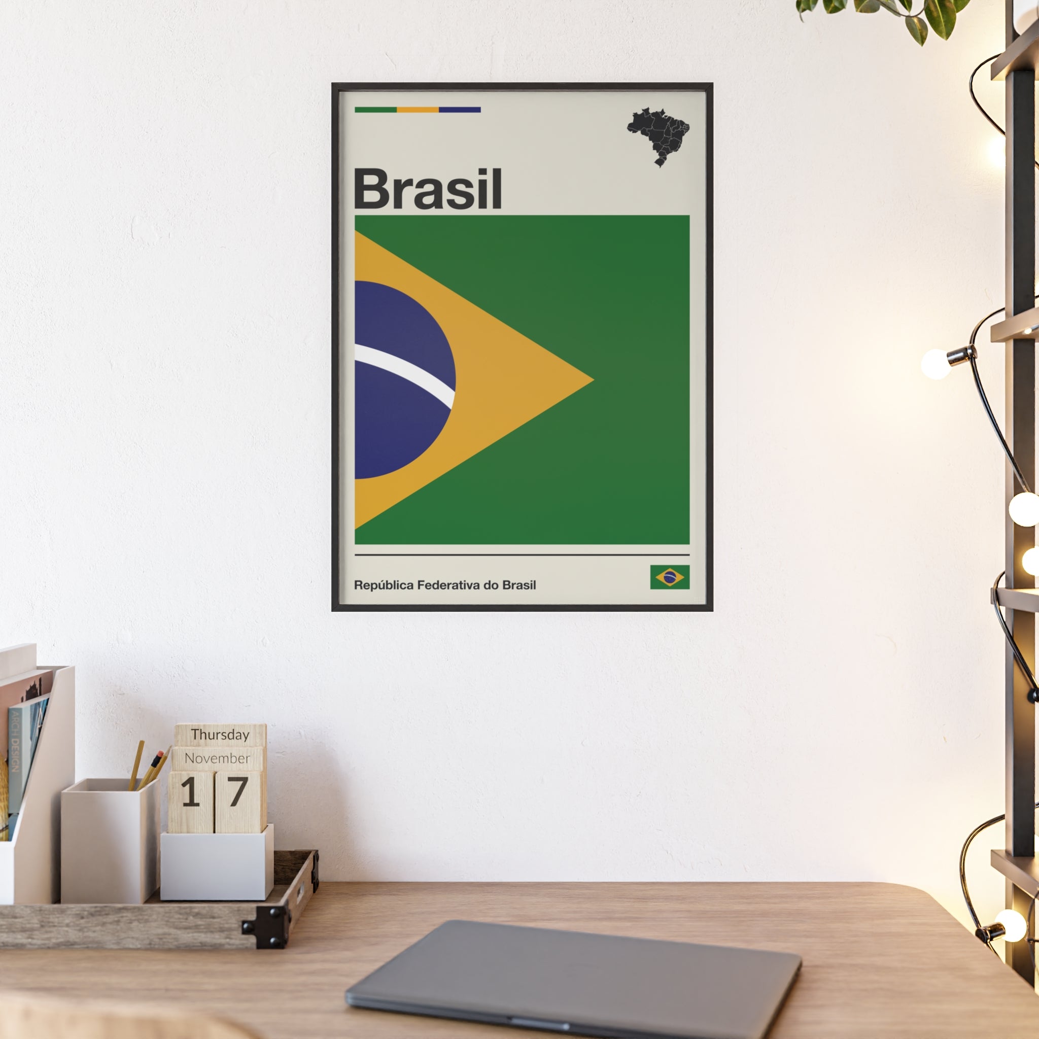 Minimalist framed Brazil flag poster in modernist style, featuring a green and yellow geometric design on an off-white background with 'Brasil' and 'República Federativa do Brasil' typography. Large 50x70 cm vertical format in a natural pinewood frame.