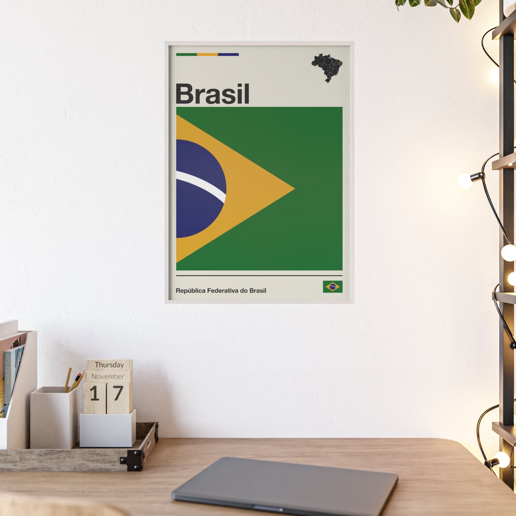 Minimalist framed Brazil flag poster in modernist style, featuring a green and yellow geometric design on an off-white background with 'Brasil' and 'República Federativa do Brasil' typography. Large 50x70 cm vertical format in a natural pinewood frame.