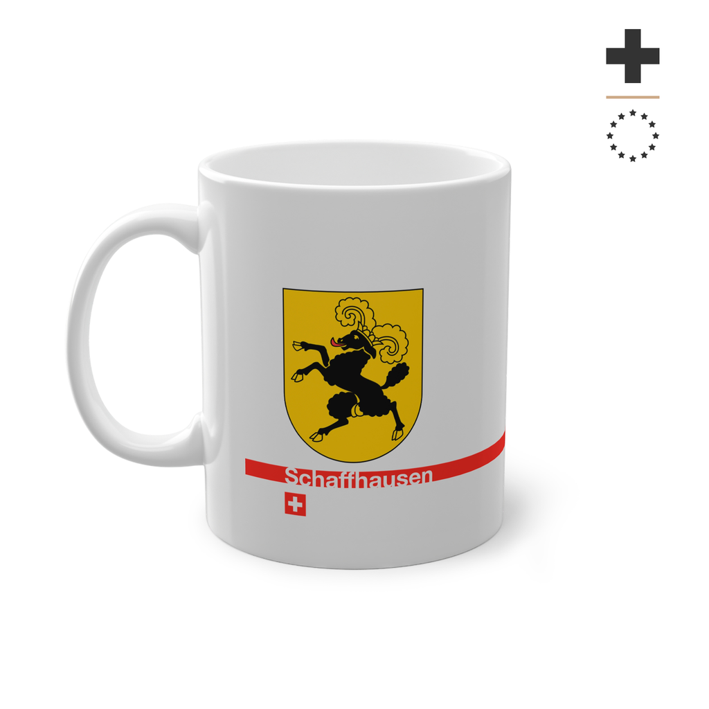 White ceramic mug featuring the golden Canton of Schaffhausen coat of arms with a black ram, a modern red horizontal line with 'Schaffhausen' text, and a small Swiss cross below.