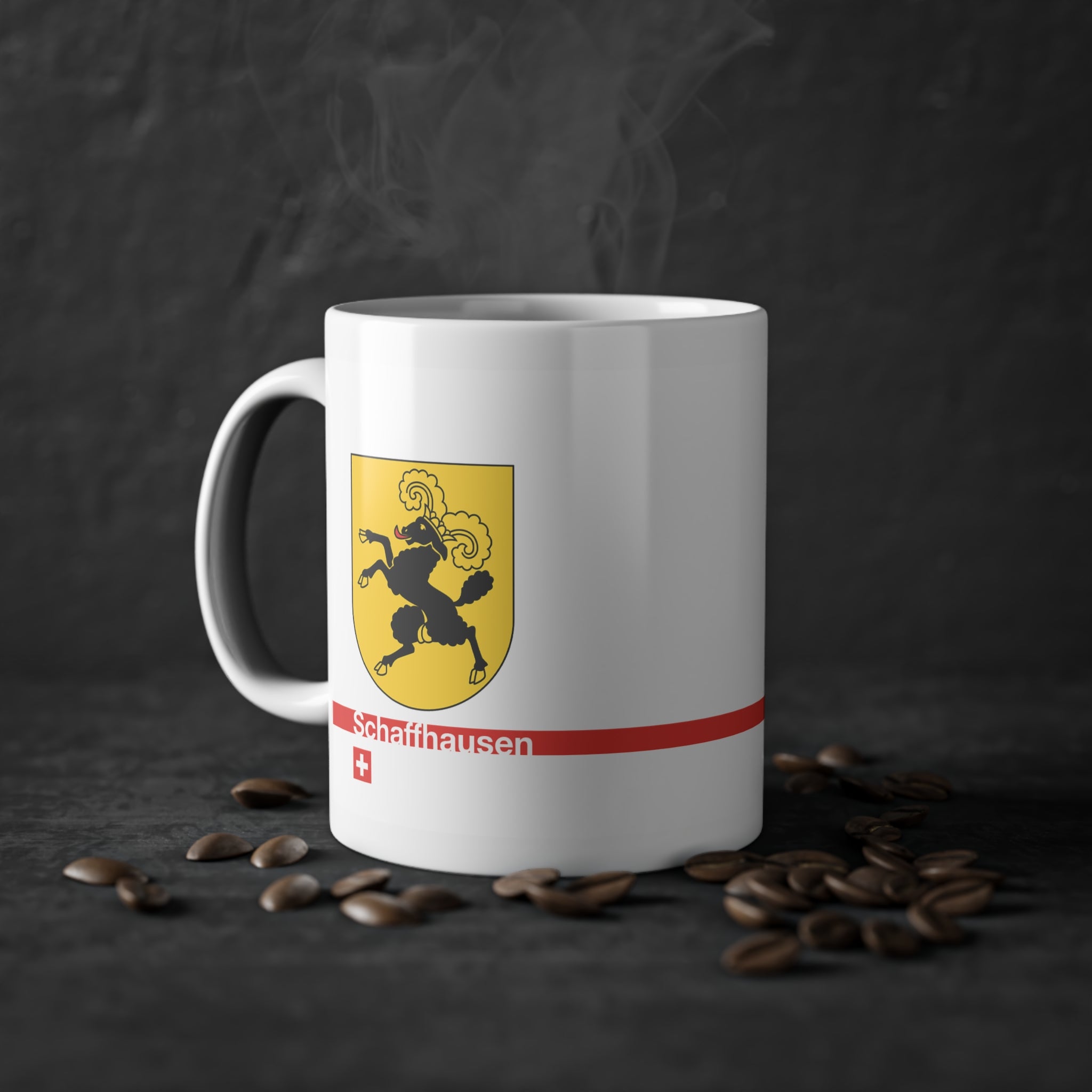 White ceramic mug featuring the golden Canton of Schaffhausen coat of arms with a black ram, a modern red horizontal line with 'Schaffhausen' text, and a small Swiss cross below.