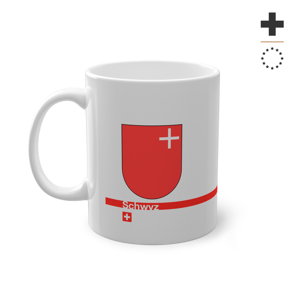 White ceramic mug featuring the red Canton of Schwyz coat of arms with a small white cross, a modern red horizontal line with 'Schwyz' text, and a small Swiss cross below.