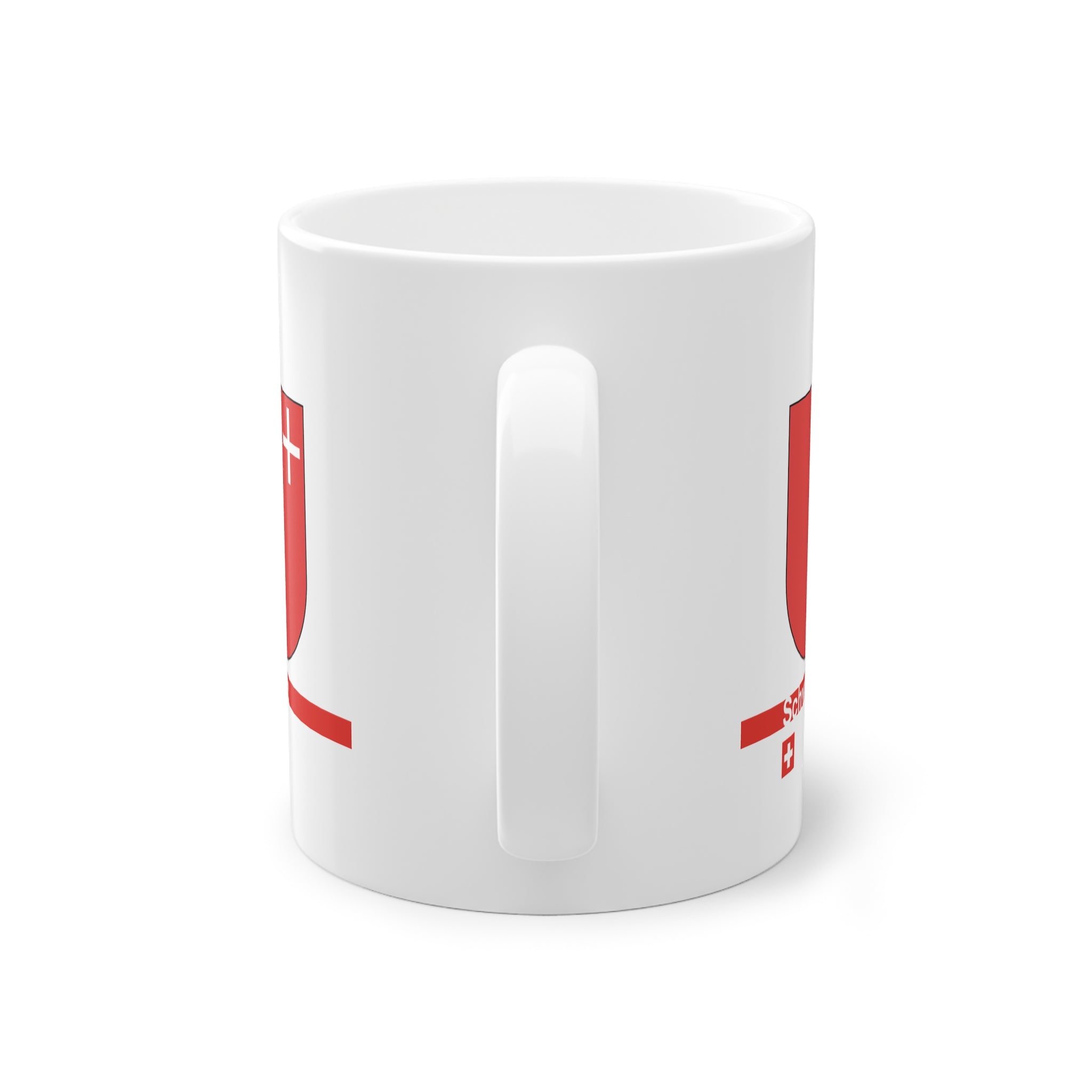 White ceramic mug featuring the red Canton of Schwyz coat of arms with a small white cross, a modern red horizontal line with 'Schwyz' text, and a small Swiss cross below.
