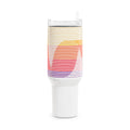 40oz stainless steel travel tumbler with handle and straw, featuring a glossy white base and a retro linear sunset gradient print in yellow, red, and purple.