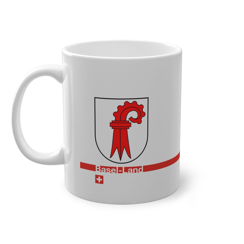 White ceramic mug featuring the red Basel-Landschaft coat of arms (red Baselstab), with a modern red horizontal line containing the text 'Basel-Land' and a small Swiss cross below.