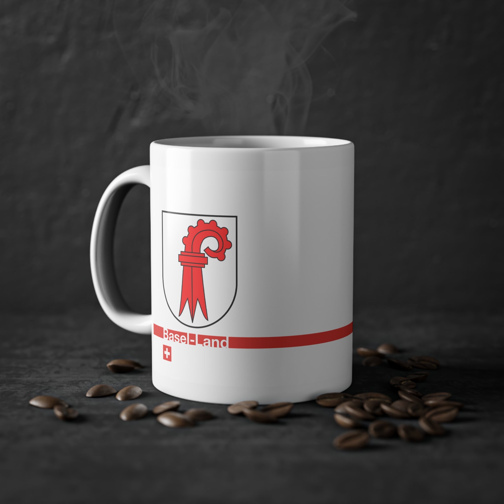 White ceramic mug featuring the red Basel-Landschaft coat of arms (red Baselstab), with a modern red horizontal line containing the text 'Basel-Land' and a small Swiss cross below.