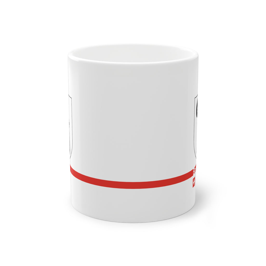 White ceramic mug featuring the black Baselstab (Canton of Basel coat of arms), with a modern red line and a small Swiss cross.
