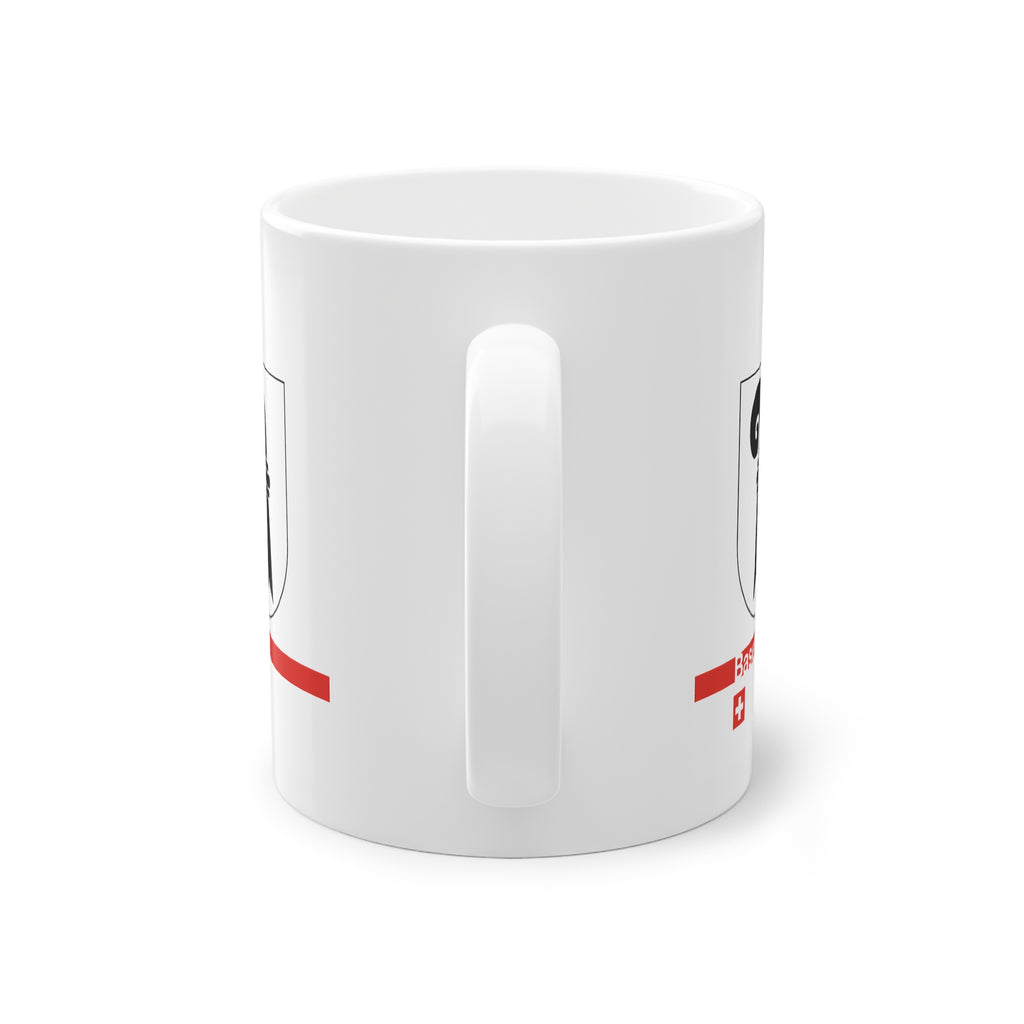White ceramic mug featuring the black Baselstab (Canton of Basel coat of arms), with a modern red line and a small Swiss cross.