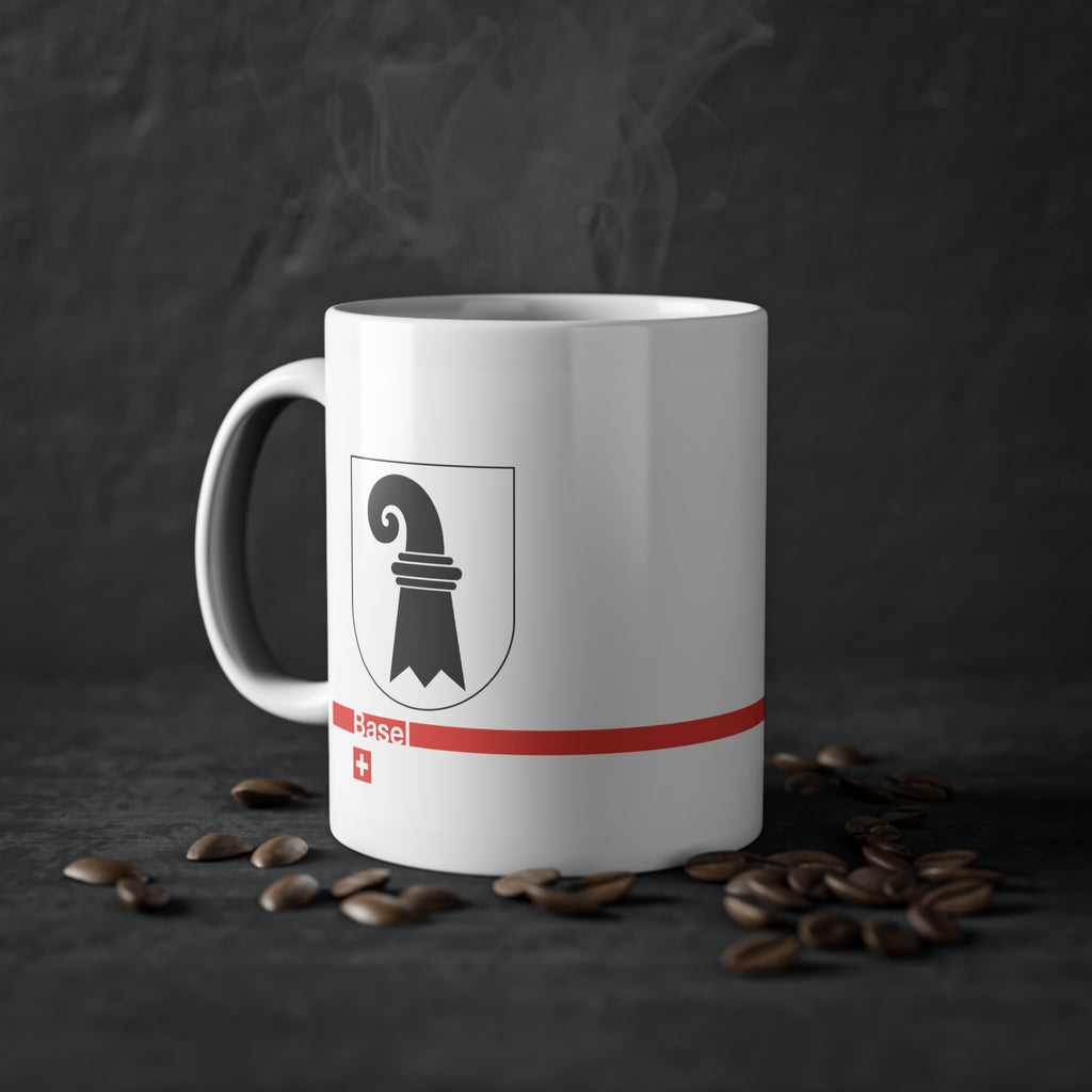 White ceramic mug featuring the black Baselstab (Canton of Basel coat of arms), with a modern red line and a small Swiss cross.