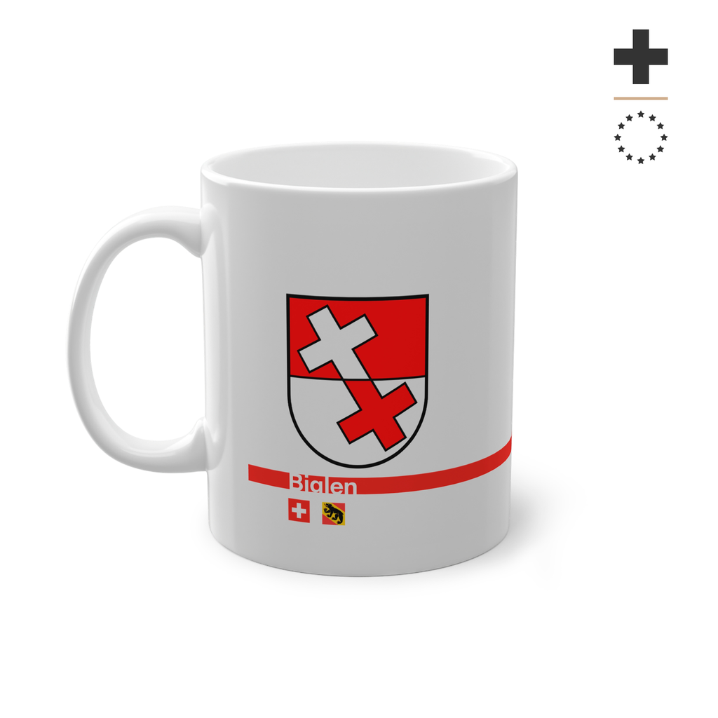 White ceramic mug featuring the red and white split coat of arms of the Biglen Commune, a modern red horizontal line with 'Biglen' text, and small Swiss and Bernese bear flags below.