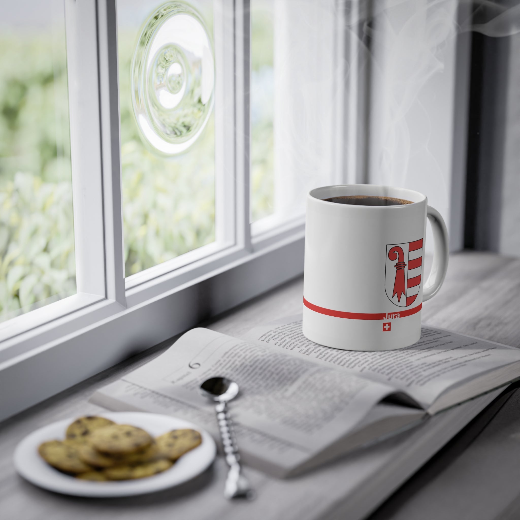 White ceramic mug featuring the red and white Canton of Jura coat of arms (bishop's crosier and seven stripes), a modern red horizontal line with 'Jura' text, and a small Swiss cross below.