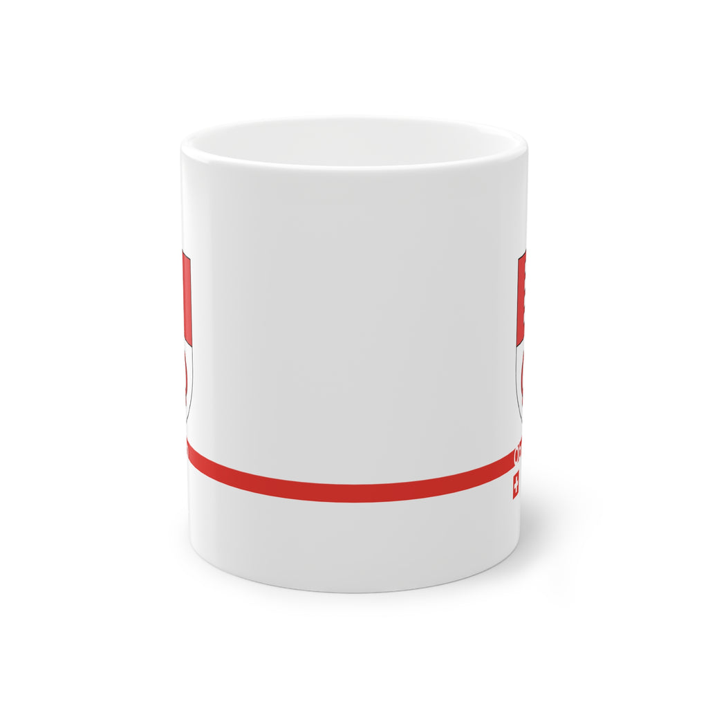 White ceramic mug featuring the red and white split Canton of Obwalden coat of arms (single white key), a modern red horizontal line with 'Obwalden' text, and a small Swiss cross below.