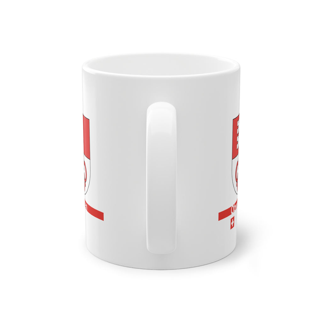 White ceramic mug featuring the red and white split Canton of Obwalden coat of arms (single white key), a modern red horizontal line with 'Obwalden' text, and a small Swiss cross below.