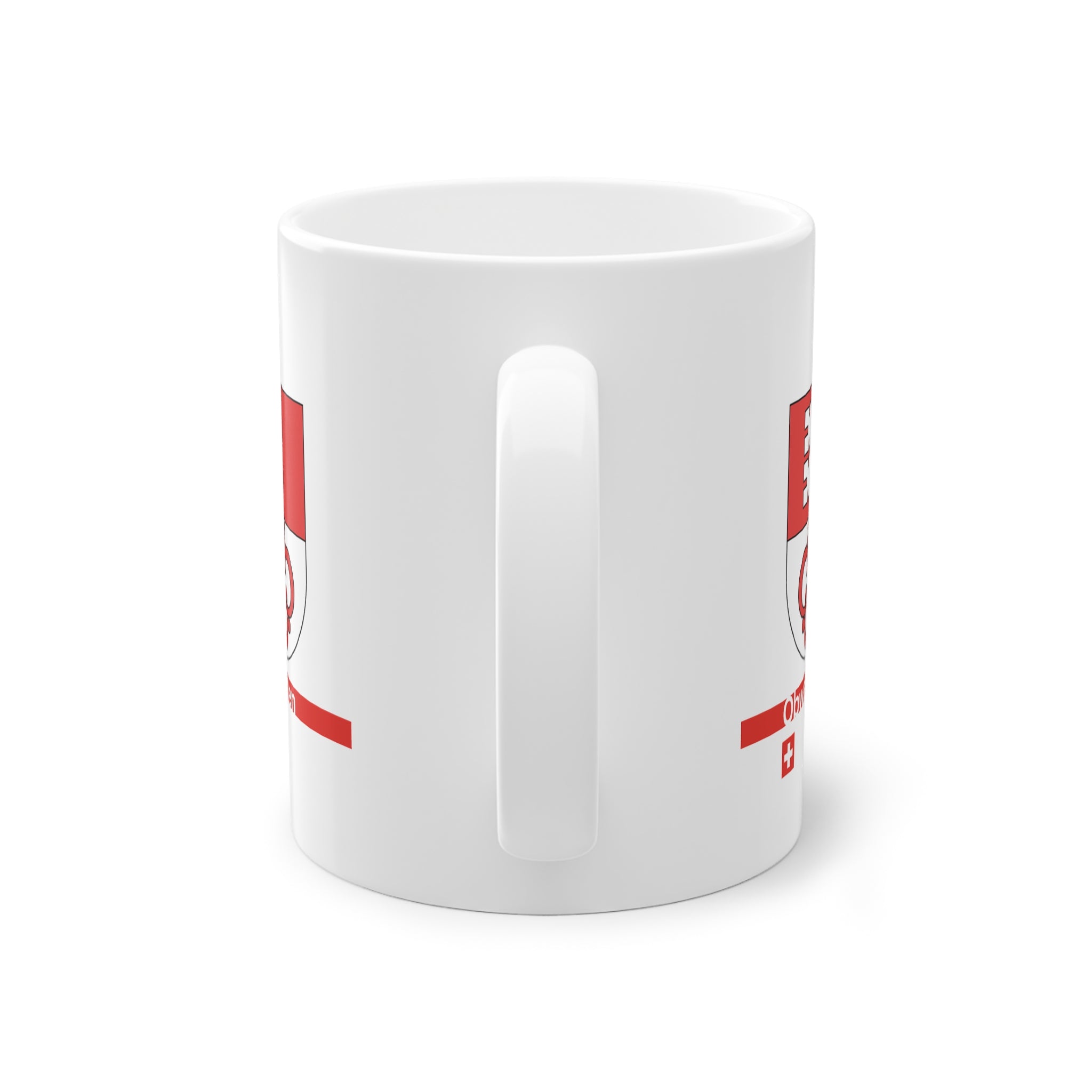 White ceramic mug featuring the red and white split Canton of Obwalden coat of arms (single white key), a modern red horizontal line with 'Obwalden' text, and a small Swiss cross below.