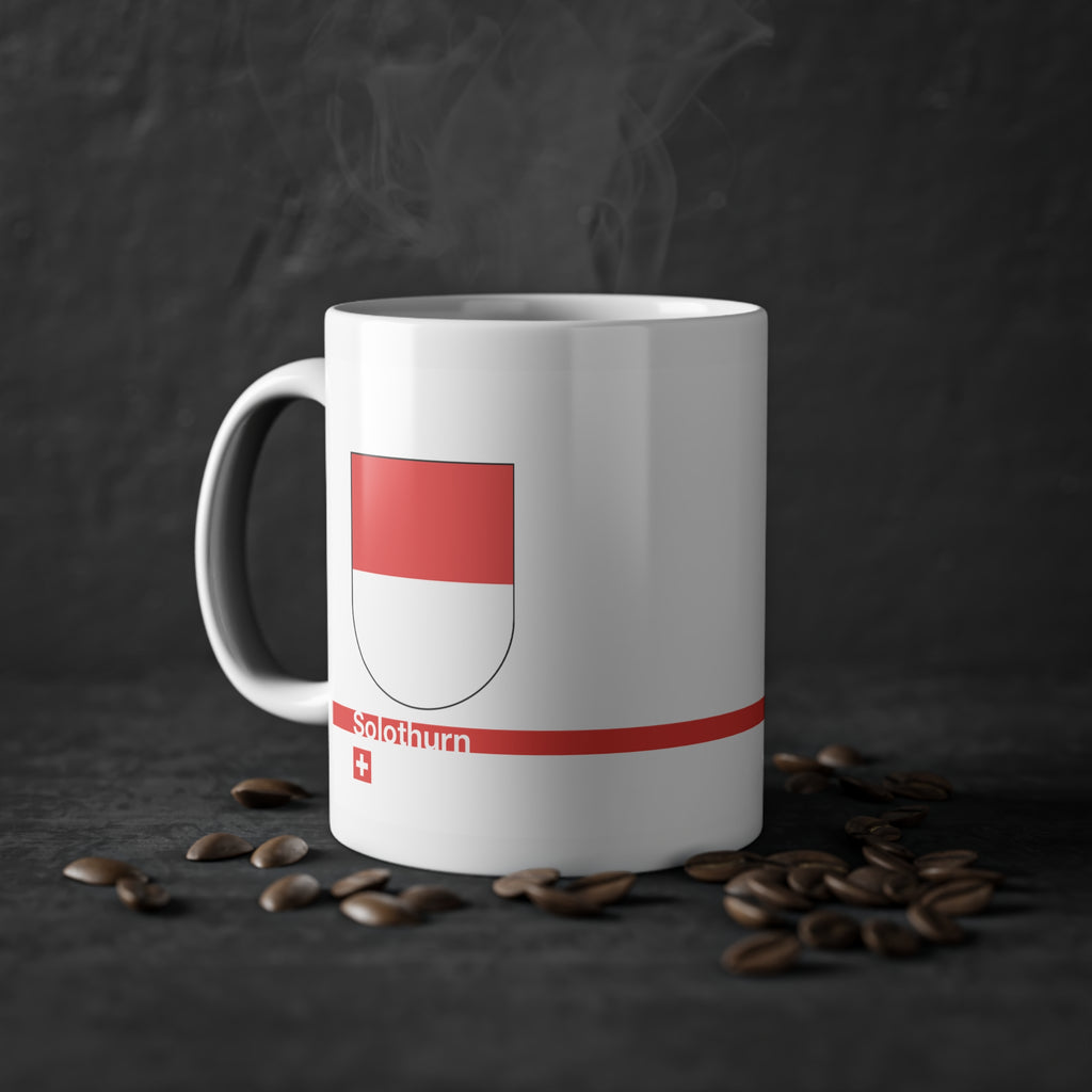 White ceramic mug featuring the red and white horizontal coat of arms of the Canton of Solothurn, a modern red horizontal line with 'Solothurn' text, and a small Swiss cross below.