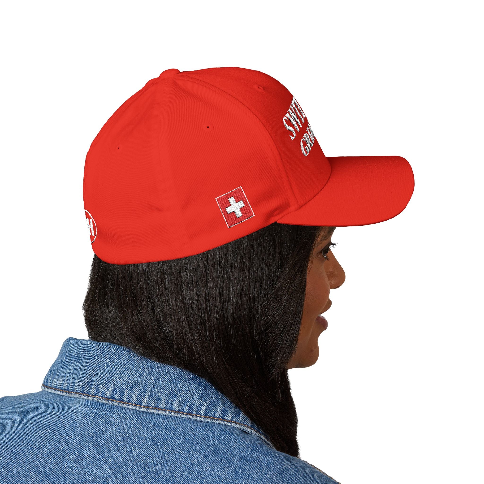 Product multi-angle mockup views of a premium red structured Swiss baseball cap. Front features white 'SWITZERLAND GREAT SINCE 1291' embroidery. Right side displays the Swiss cross flag, left side features country names in German, French, Italian, and Romansh, and the closed back shows a circular CH logo.