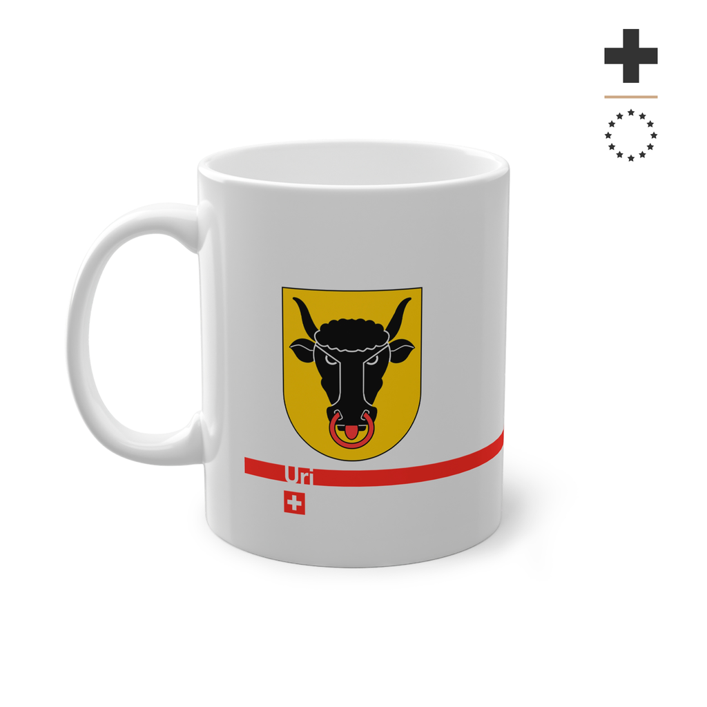 White ceramic mug featuring the golden Canton of Uri coat of arms with a black bull's head and red nose ring, a modern red horizontal line with 'Uri' text, and a small Swiss cross below.
