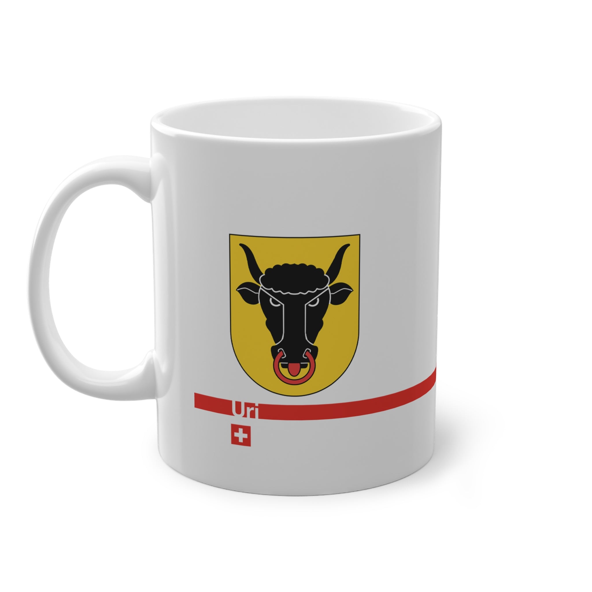 White ceramic mug featuring the golden Canton of Uri coat of arms with a black bull's head and red nose ring, a modern red horizontal line with 'Uri' text, and a small Swiss cross below.