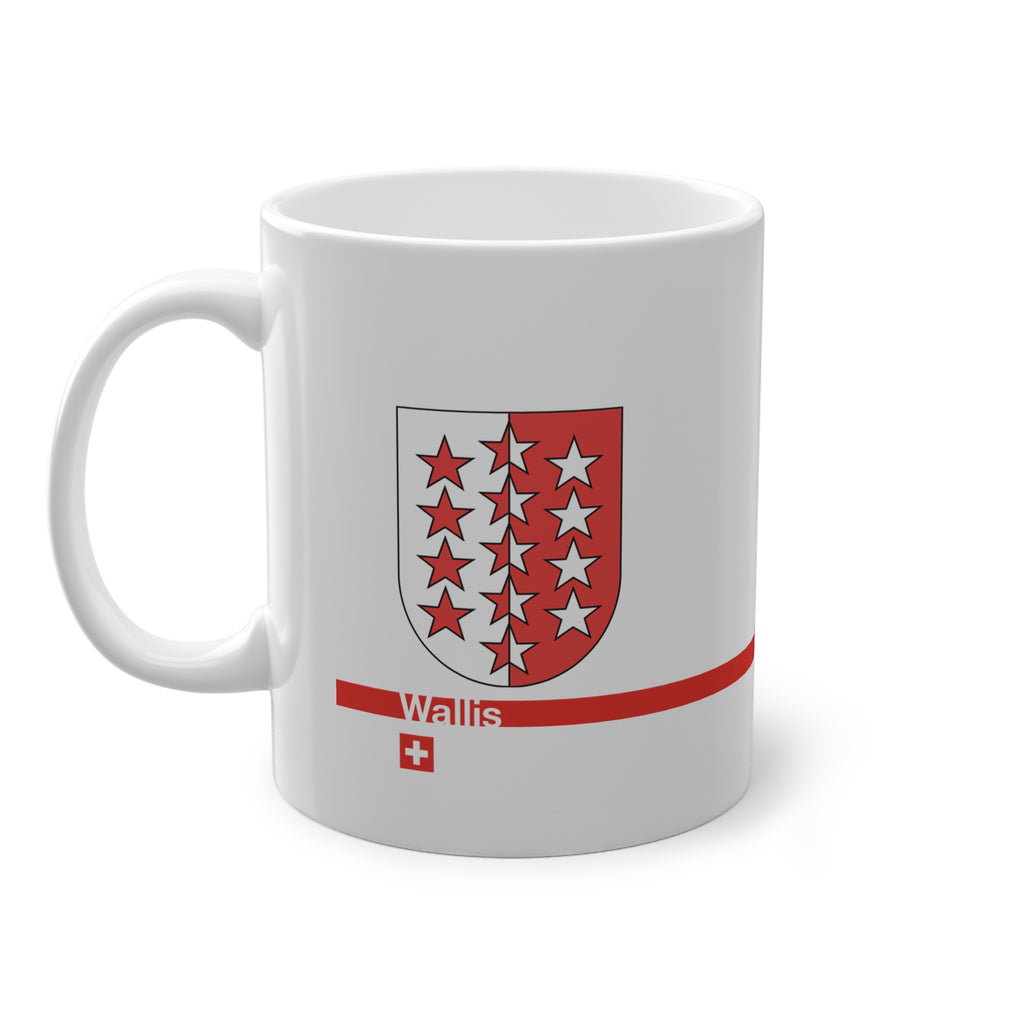 White ceramic mug featuring the red and white Canton of Wallis (Valais) coat of arms with 13 stars, a modern red horizontal line with 'Wallis' text, and a small Swiss cross below.