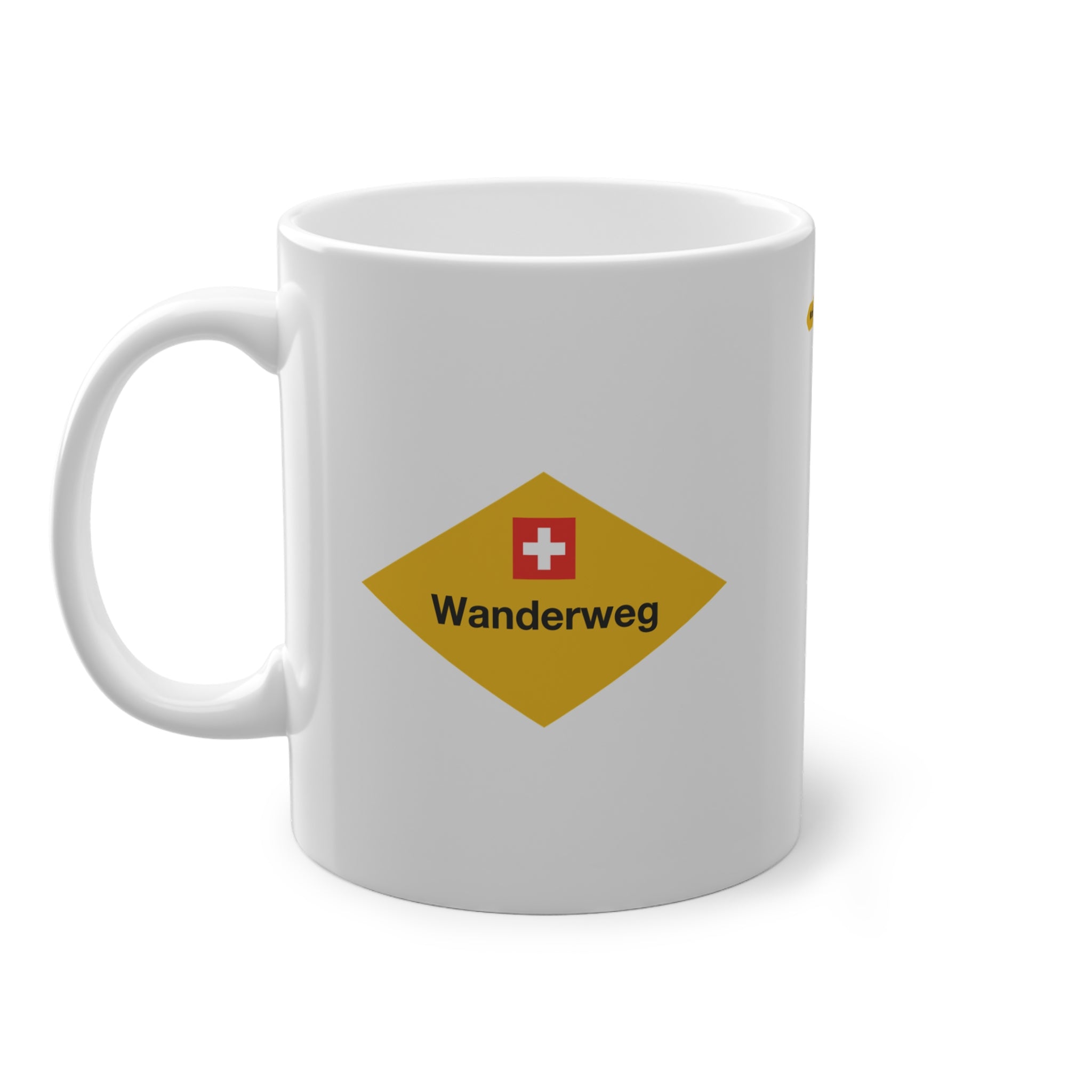 Yellow Swiss hiking trail sign coffee mug on a wooden table