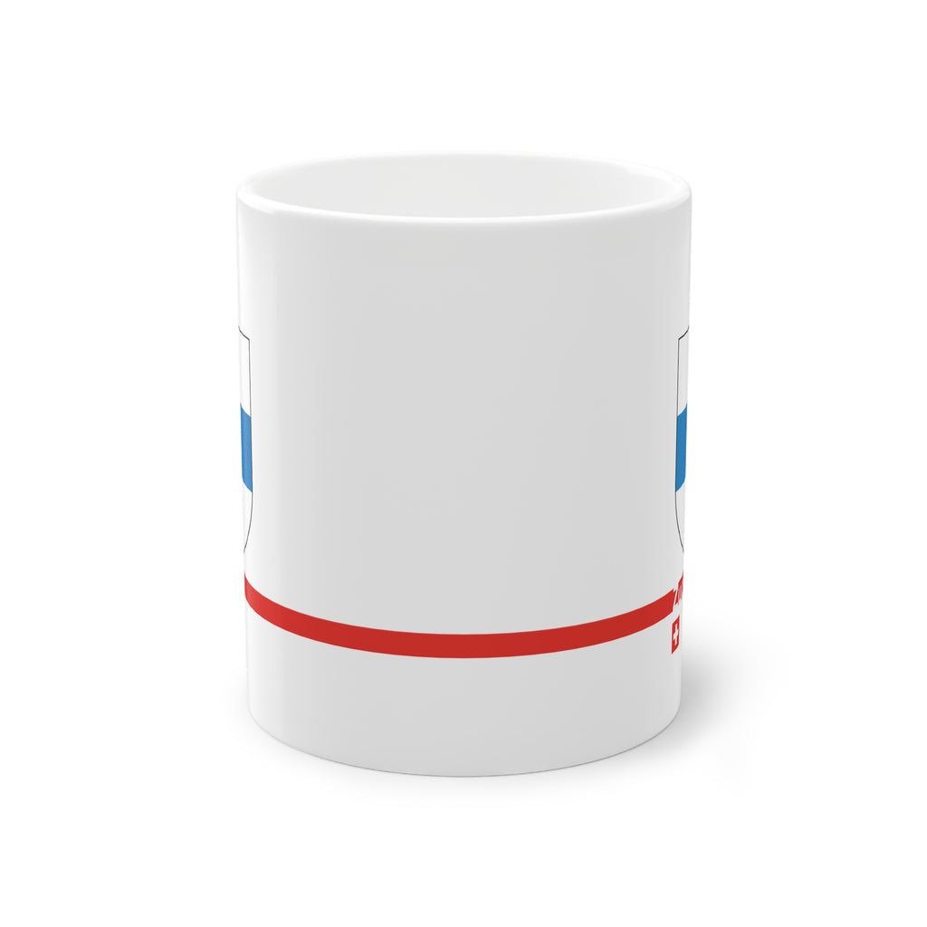 White ceramic mug with the blue and white horizontal coat of arms of the Canton of Zug, Switzerland, featuring a modern red line and a small Swiss cross.