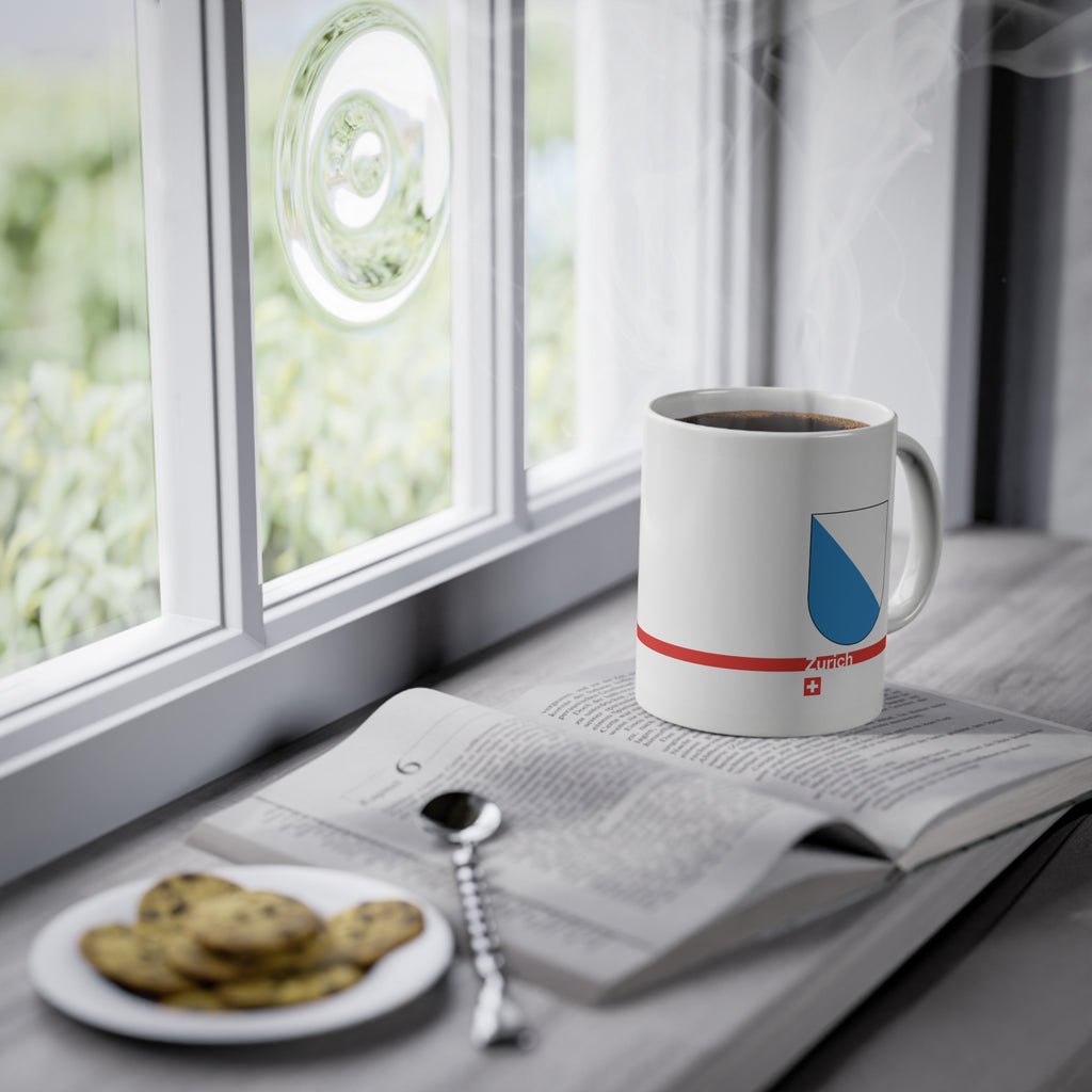 White ceramic coffee mug with the blue and white diagonally divided coat of arms of the Canton of Zurich, Switzerland.